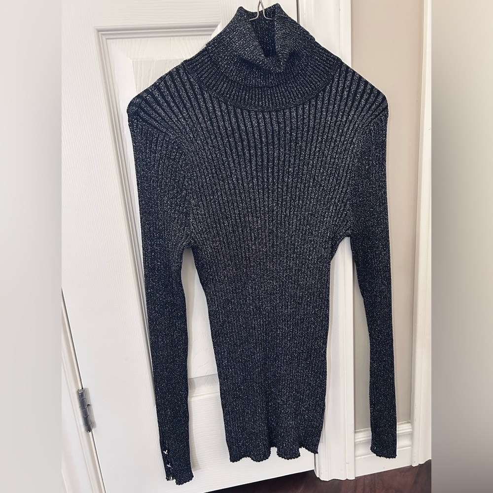 Ladies long sleeved turtleneck sweater.